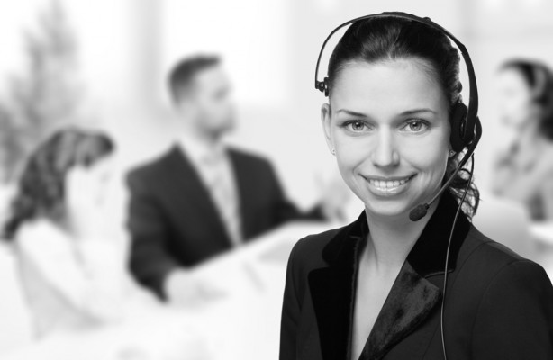 Customer support operator woman smiling at an office